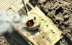 A compilation of UA drones dropping munitions on RU IFVs