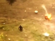 ORC runs and falls and shrapnel hits all around him