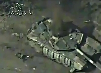 The destruction of a ORC tank, see the burning of a crew member