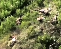 A group of Ukrainian soldiers come under AGS fire