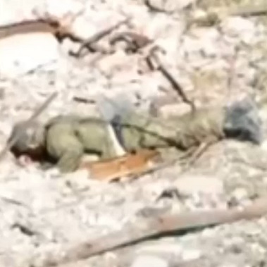Russian Corpse Blown to Pieces