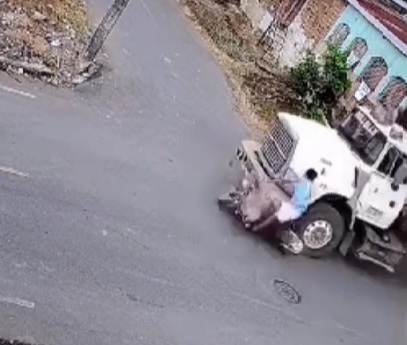 Speeding Motorcyclist crushed hard by big truck 