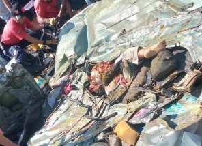 Horrific aftermath of traffic accident between a van and a tanker