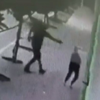 Hitman Runs Across The Road to Take Woman's Life