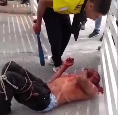 Thief Punished by Angry Crowds, Saved by Police