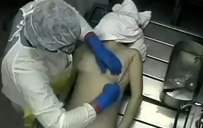 Mortician Removing Female Chest
