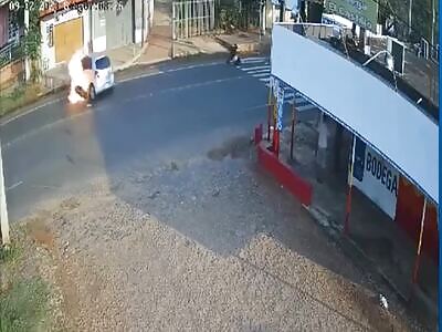 biker flies when colliding