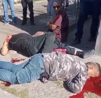 Two murder victims and one injury after sicario open fire on his targe