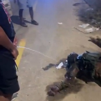 Another Israeli Man Pisses On The Bodies Of Murdered Palestinians.