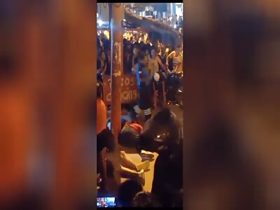 Santa Elena outside a nightclub in San Pablo, with multiple citizens d