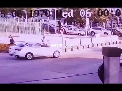 A man is shot dead after throwing a hand grenade at police officers.