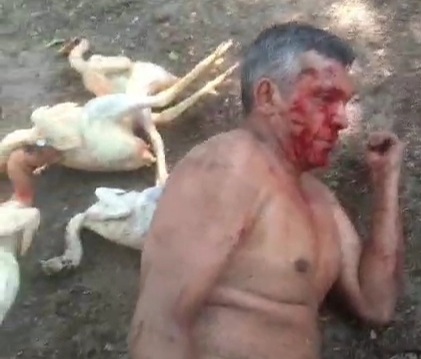 Angry farmers beat the shit out of chicken thief 