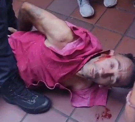 Thief saved by police from angry crowds 