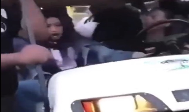 Girls trying to rescues wounded fat man 