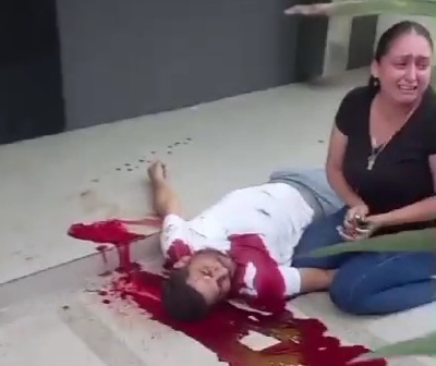 Robbed and executed in front of ATM