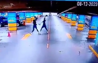 Biker Attacks Girl with his Helmet in Parking Garage.