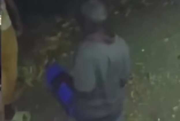 Whipping old man in Haiti 