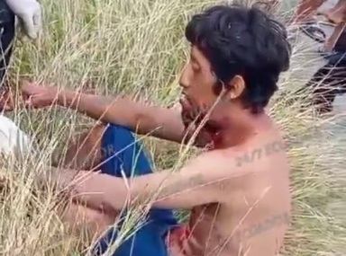 YOUNG MAN WAS WALKING WITH A SHOT AT THE HEIGHT of his THROAT 