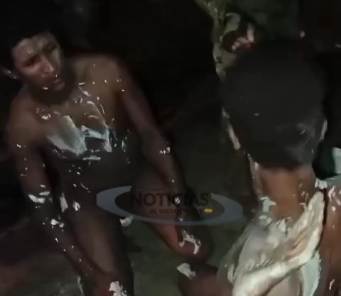 Ecuadorian soldiers punishing captured criminals 