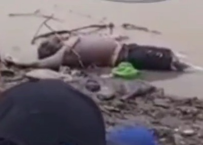 Drowned dead body floating in river 