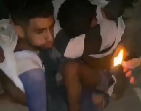 Ecuadorian army soldiers beating and burning criminals 