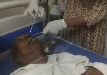 Indian female doctor removing eyeballs from another dead body 