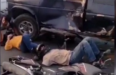 Two on motorcycle crashed into car