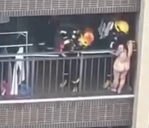 Brave Nude Woman Climbs to Escape the Fire.