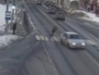 Schoolboy crossing street crashed hard by speeding car 