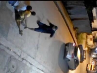 Thief being Punished  by 2 brave citizens