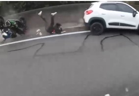 biker was thrown into the corner