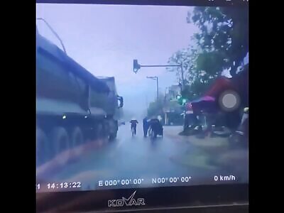 Woman on bicycle in blind spot gets completely crushed by truck 