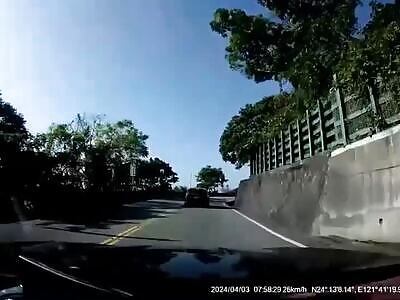 Car hit by falling boulder during Taiwanese earthquake 