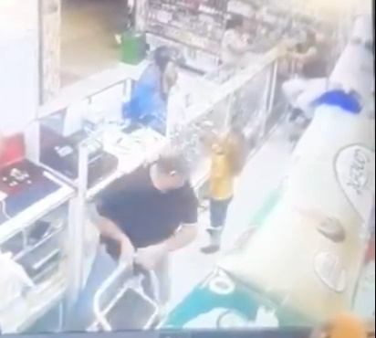 Night Time Head Shot Assassination Inside Store.