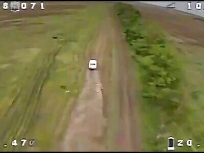 Kamikaze Takes Out Shabby LADA with Orc Passengers