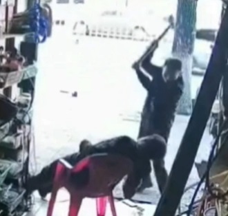 UNCENSORED: Guy Sat Chilling Has His Head Split Open With An Axe