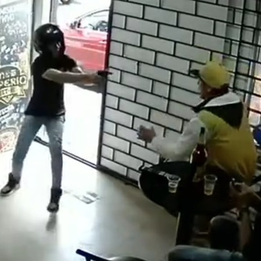 Watch the Man in Yellow... He's Going to be Assassinated Right