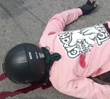 man has just been murdered by motorized sicario who fled. 