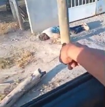 Cartel members finishing off a man 