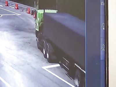 22 Wheel Truck Runs over Oblivious Trio on Motorbike!