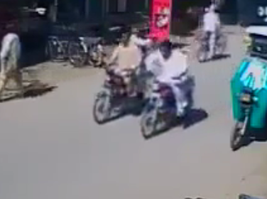 Terrorists on a Bike Kill a Person Riding a Motorcycle by Shots to the Head 