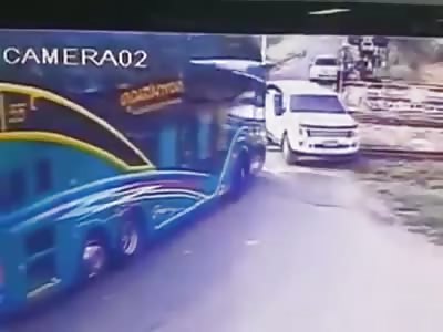 Train Hits Tour Bus at Railway Crossing