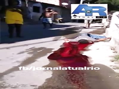 Family Members Crying as Thug is Lying Dead on the Street with Heavy Loss of Blood