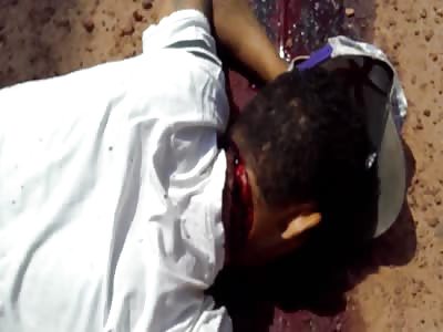 Guy Lying Dead with Deep Cut to the Neck after Machete Fight