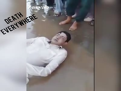 Drowned Man's Body Dragged Out of Water