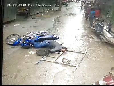 Biker Killed by Falling Metal from 4th Floor