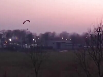 Guy on Parachute gets Electrocuted on Power Lines