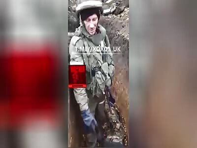 Russian soldiers inspect dead Ukrainians 