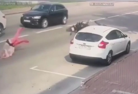 biker ran red light at high speed and hit girl who was crossing street