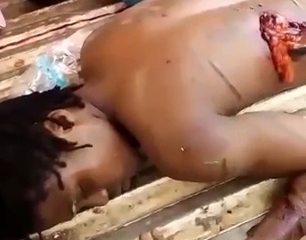 Carrying two killed gang members to the morgue 